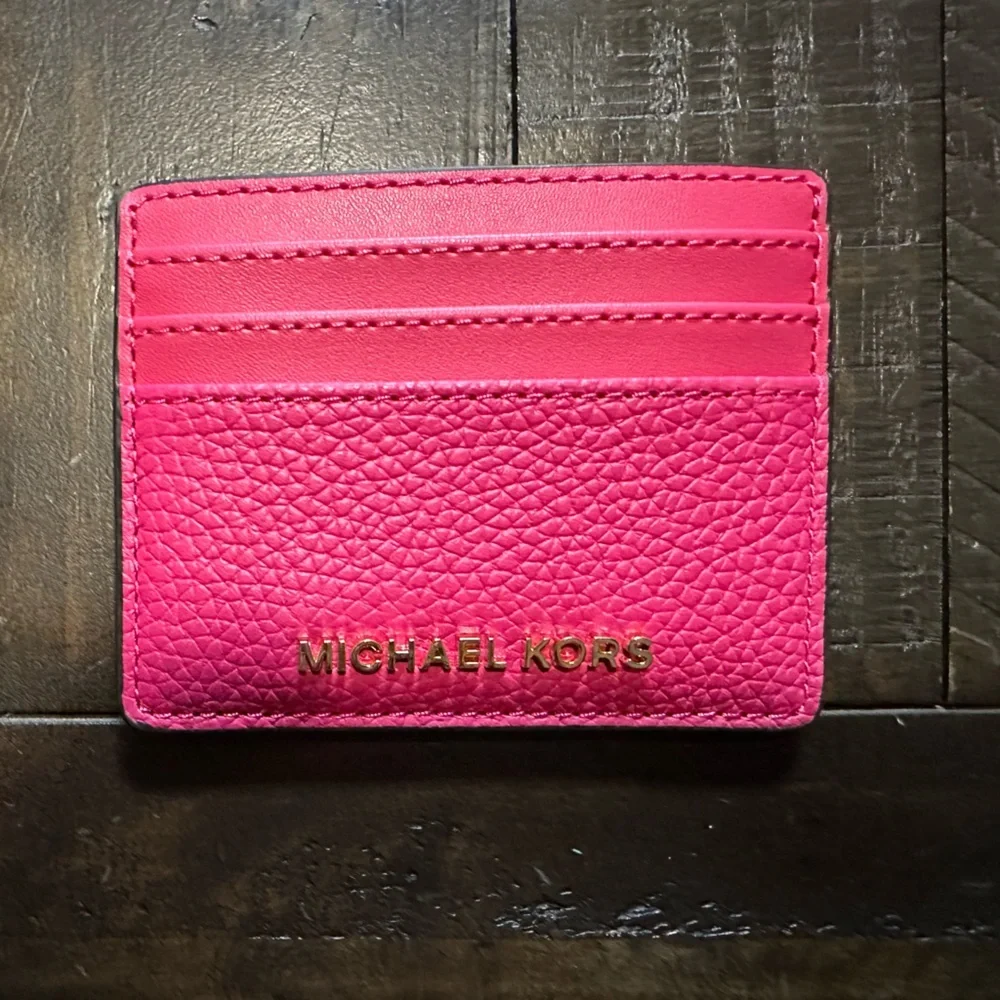 Michael Kors electric pink jet set travel wallet with ID slot. New with tags.